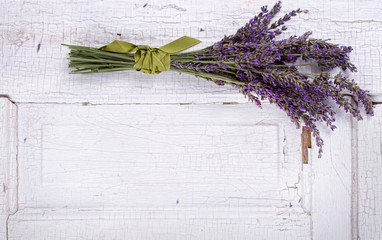 lavender laying on an old door panel
