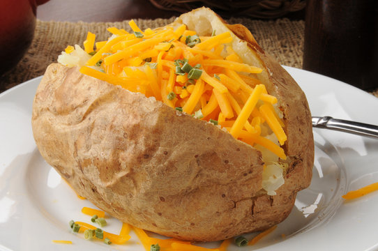 Baked potato with grated cheese