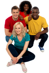 Group of friends sitting on floor