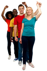 Obraz premium Excited group of cheerful people, full length shot