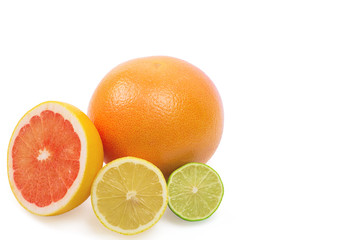 Image of a fresh whole lime, lemon and orange isolated on white