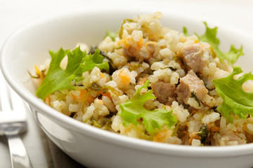 Rice with pork, carrots and spinach