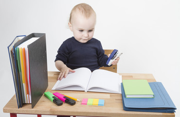 young child at writing desk