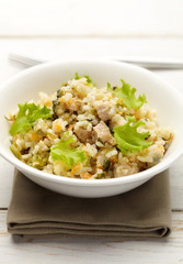 Rice with pork, carrots and spinach