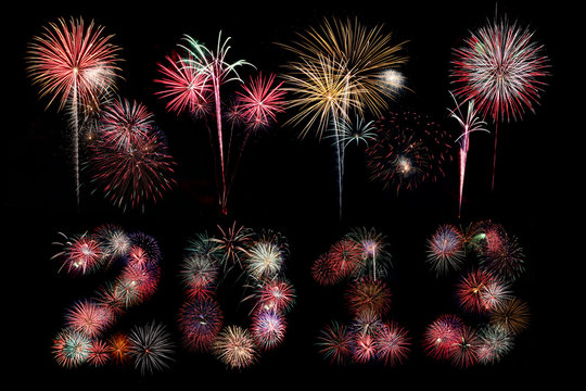 The year 2013 written in fireworks below bursts