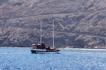 boat off the coast of the island in summer