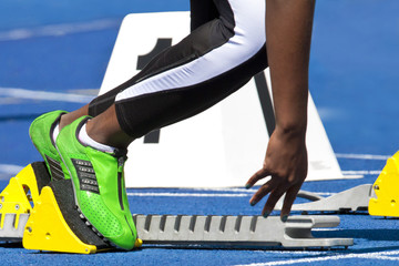 female sprinter starting