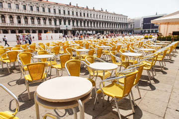 Rows of chairs and tables at the outdoor restaurant in Venice