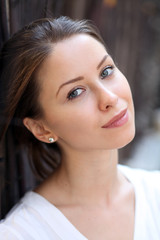 Fototapeta premium Beautiful young woman. Outdoor portrait
