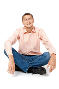 Smiling Man Sitting In The Lotus Position