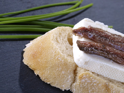 Anchovies and fresh cheese tapas.