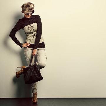 Fototapeta A photo of sexual beautiful girl is in fashion style
