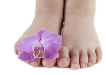 Obraz na płótnie Canvas Małe stopy z orchidei