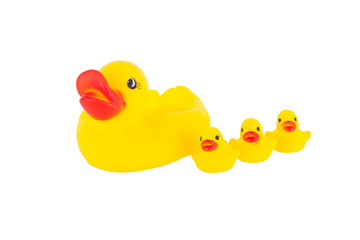 Yellow rubber duck with ducklings