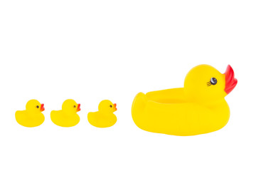 Yellow rubber duck with ducklings