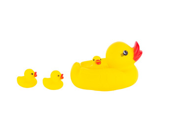 Yellow rubber duck with ducklings