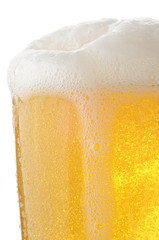 Closeup of a glass of foamy beer