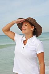 Attractive Woman Standing on the Beach