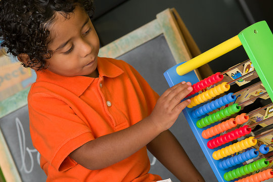 Child Using Abacus