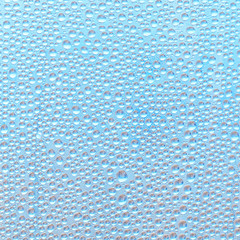 Water droplets on the surface of the transparent