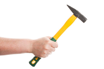 Female hand holding a hammer