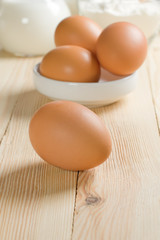 Basic ingredients for dough. Milk, eggs and flour.