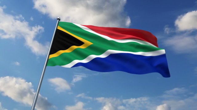 South African flag waving against clouds background