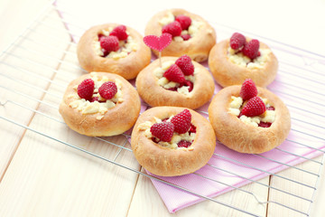 buns with raspberries