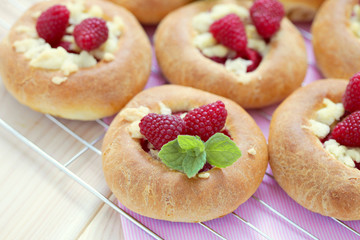 buns with raspberries