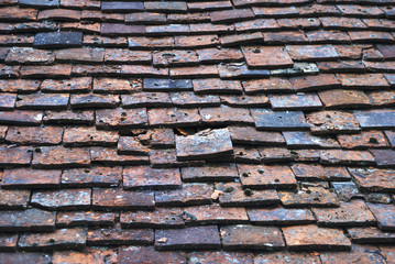 Old clay tiles on shed roof