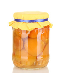 Jar with canned apricots isolated on white