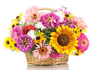 Beautiful bouquet of bright flowers in basket isolated on white