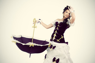 Girl with chamomile in the hair in vintage dress