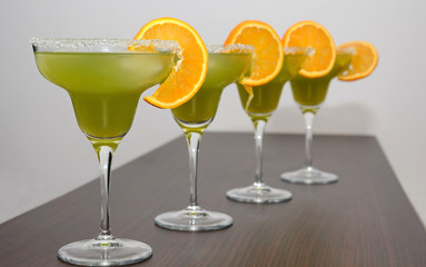Four exotic drinks on the table