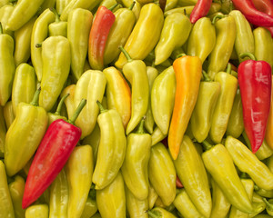 Red on green peppers, natural background