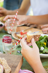 Spreading butter on bread