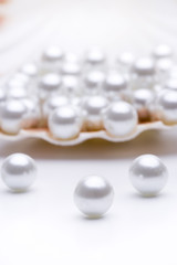 Perlen in einer Jakobsmuschel