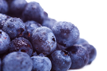 pile of fresh  blueberry fruits with water drops on