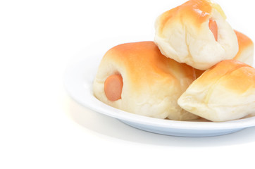 Sausage in the dough isolated on white background