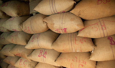 Pile of sacks stored in warehouse