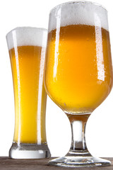 Beer in a glasses over white