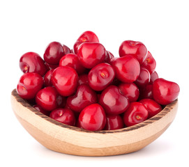 cherry berries in wooden bowl