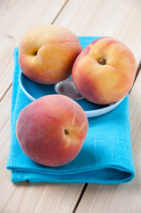 Vertical shot of freshly harvested organic peaches