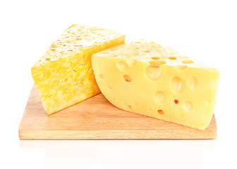 tasty cheese on wooden board isolated on white