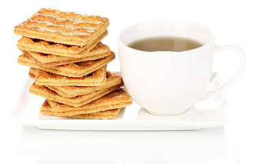 Cup of tea and cookies isolated on white