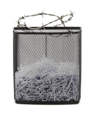 Paper shredder with metal wire basket and bardbed wire, filled w