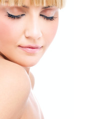Naklejka premium Close-up portrait of a young woman with closed eyes