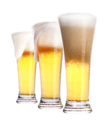 Frosty glass of light beer isolated