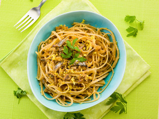 spaghetti with anchovy, grated bread and lemon peel