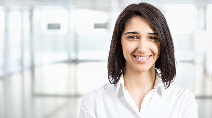 Young business woman in an office